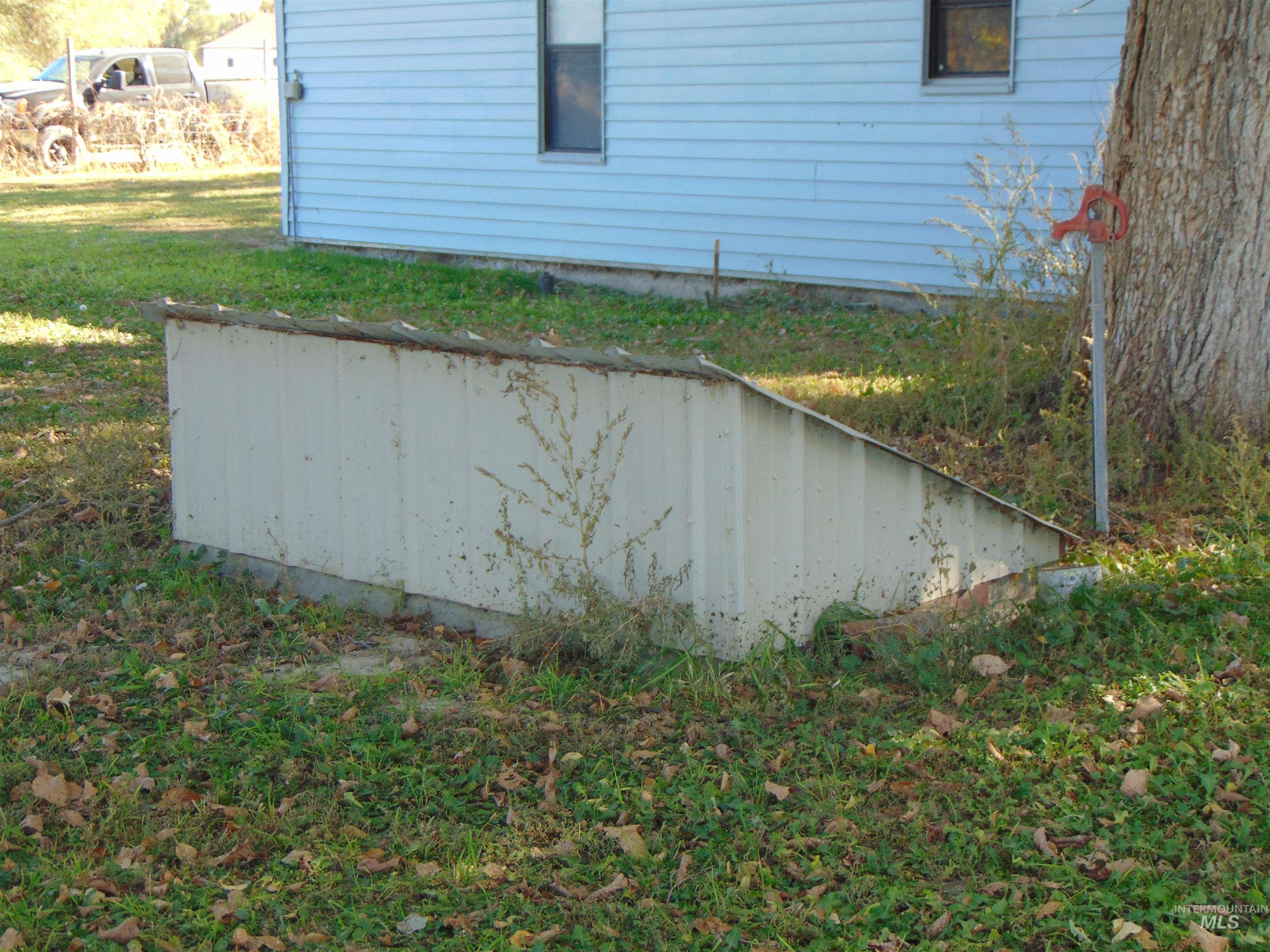 2933 2nd Street Harper, OR 97906 - Photo 6 of 28 View of property exterior featuring a lawn