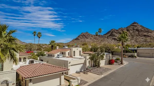 a view of a terrace with sitting area