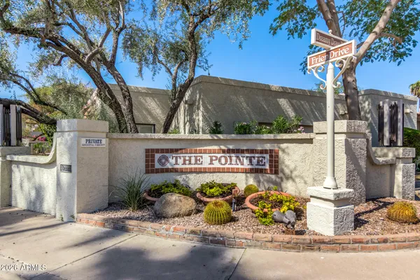 a view of street with parked cars