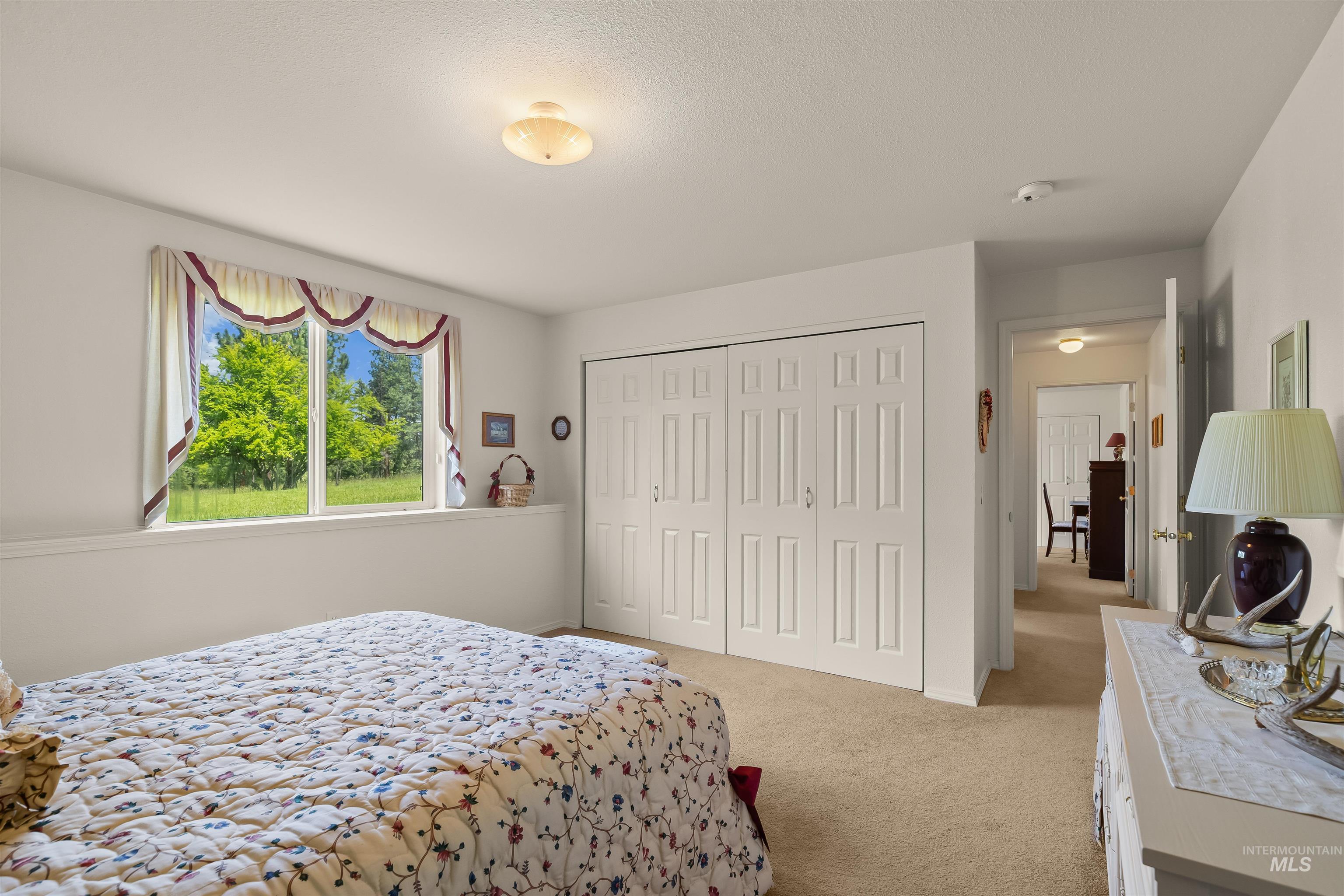 743 Wall Crk Road Stites, ID 83552 - Photo 40 of 48 Carpeted bedroom with a window featuring exterior scenery