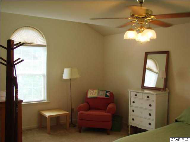 833 Harris Road Charlottesville, VA 22902 - Photo 12 of 21 Bedroom #3 also boasts a ceiling fan and full-size closet.