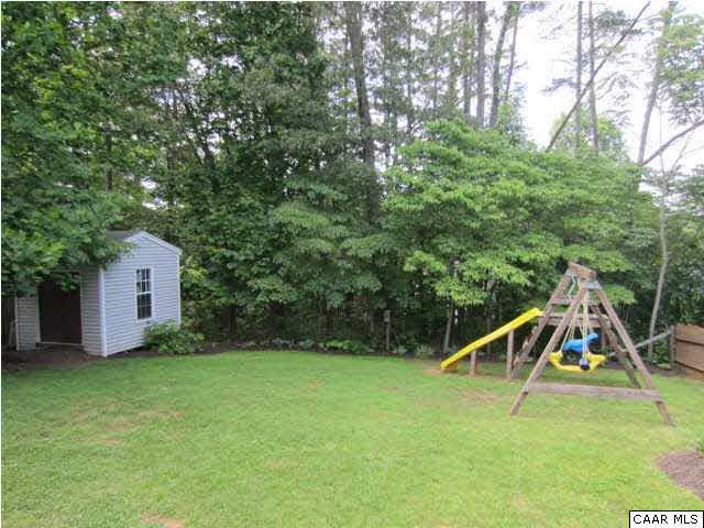 833 Harris Road Charlottesville, VA 22902 - Photo 15 of 21 This rear yard has a park-like appearance.