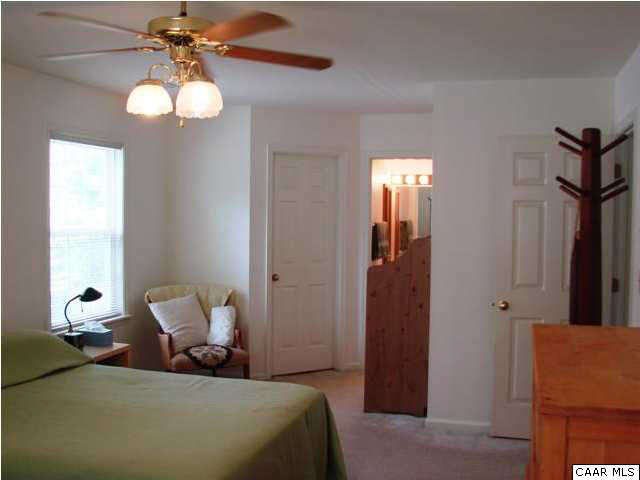 833 Harris Road Charlottesville, VA 22902 - Photo 9 of 21 There are two large closets (one walk-in), a seating area and attached full bath.