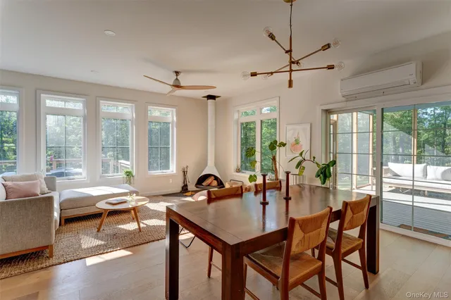 a view of a dining room with furniture window and outside view