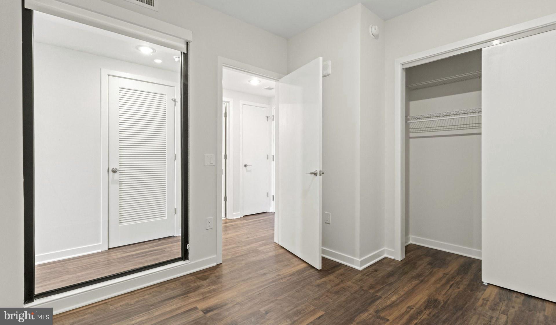4000 Wisconsin Avenue Northwest, Unit 4K236 Washington, DC 20016 - Photo 44 of 54 a view of a hallway with wooden floor