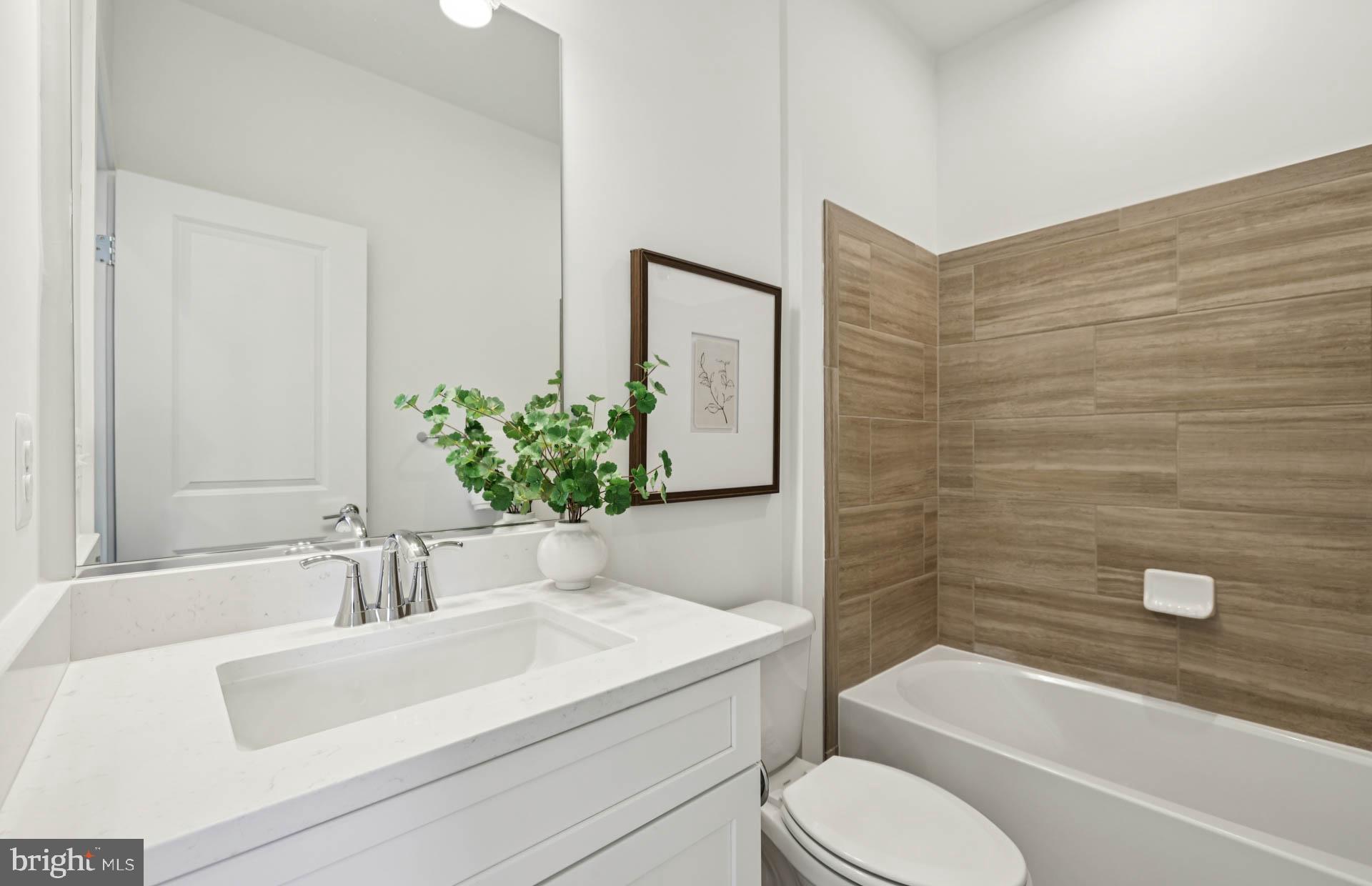 4716 Bellrock Alley Boyds, MD 20841 - Photo 24 of 47 a bathroom with a sink toilet and shower