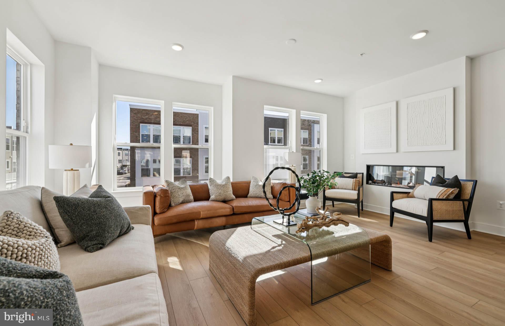 4716 Bellrock Alley Boyds, MD 20841 - Photo 4 of 47 a living room with furniture and wooden floor