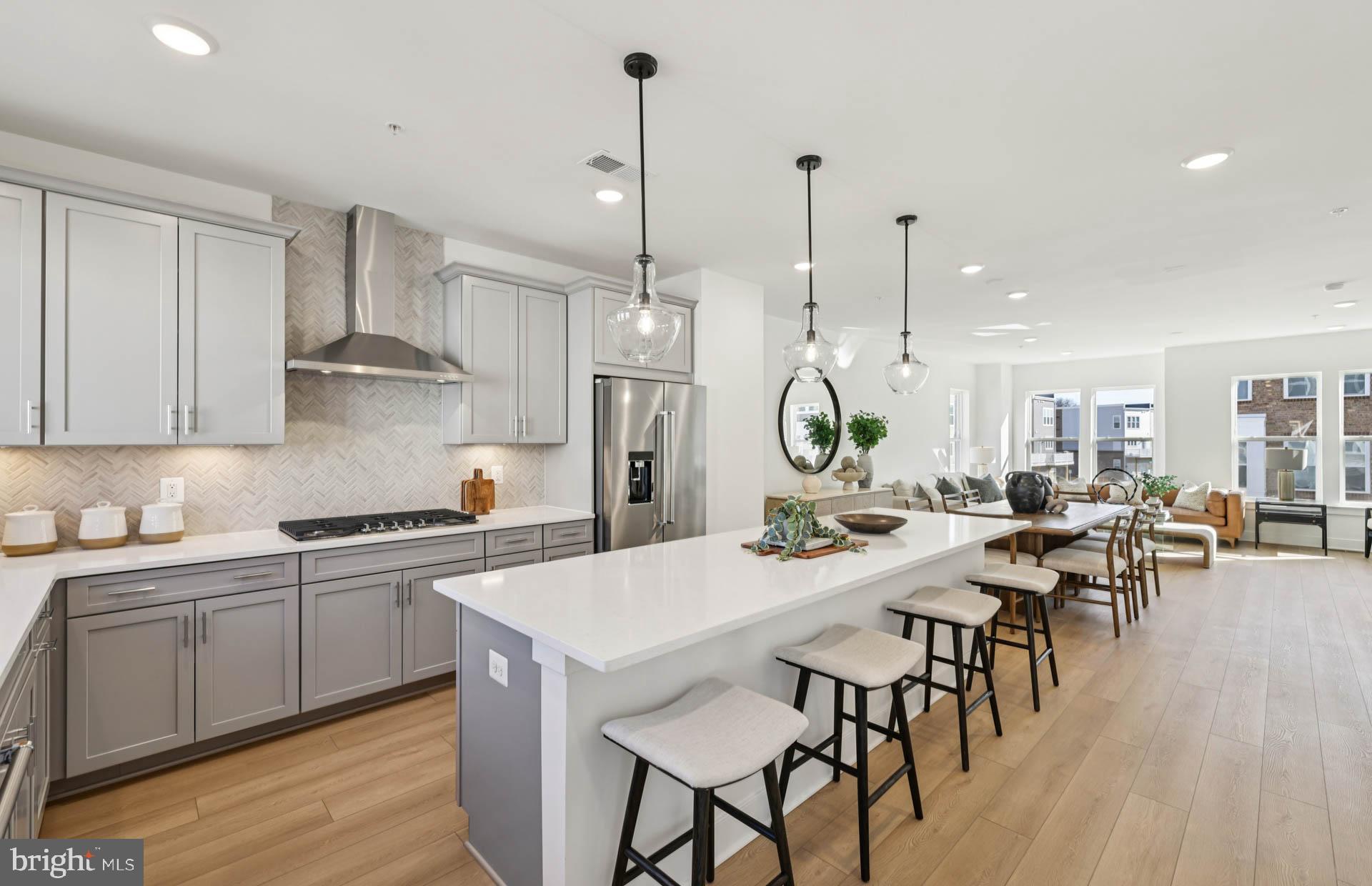 4716 Bellrock Alley Boyds, MD 20841 - Photo 10 of 47 a view of a kitchen and dining room