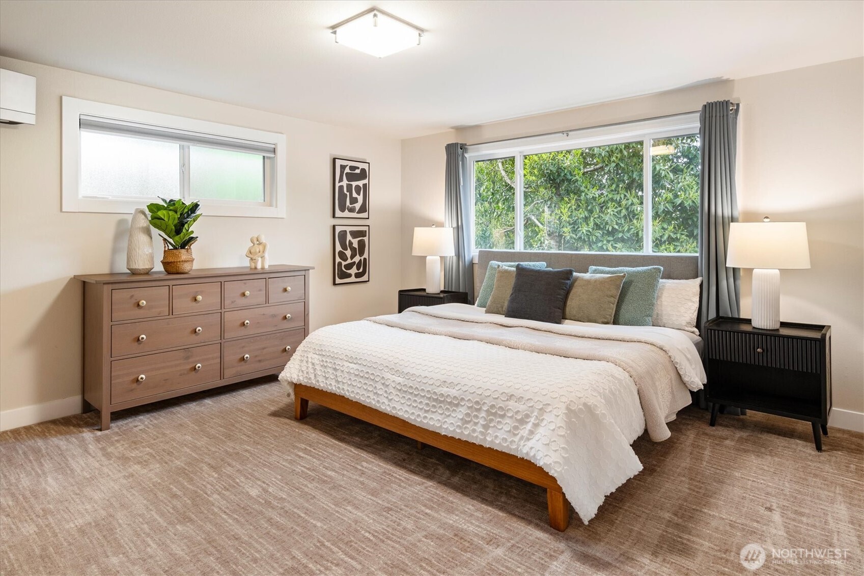 9503 Odin Way Bothell, WA 98011 - Photo 23 of 39 a bedroom with a bed and window