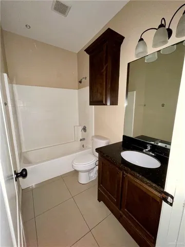 a view of a backyard with pathway