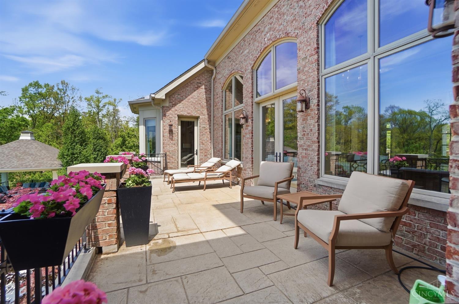 4535 Drake Road Cincinnati, OH 45243 - Photo 23 of 96 This patio is accessible from the primary bedroom, living room and kitchen.