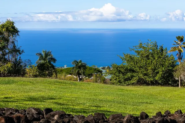 a view of a field with an outdoor space