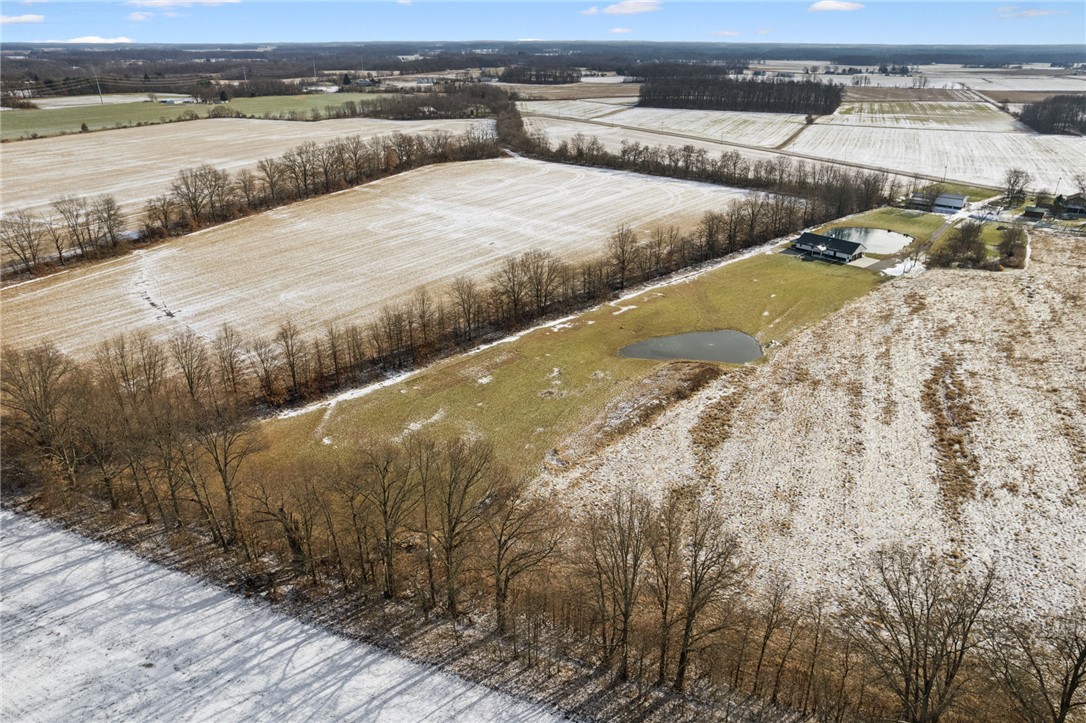 1602 Westboro Road Blanchester, OH 45107 - Photo 48 of 81 This expansive aerial view showcases a peaceful rural landscape with a large property.