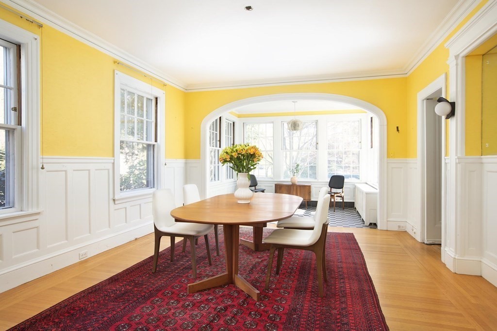 260 Dean Road Brookline, MA 02445 - Photo 8 of 14 a view of a dining room with furniture and wooden floor