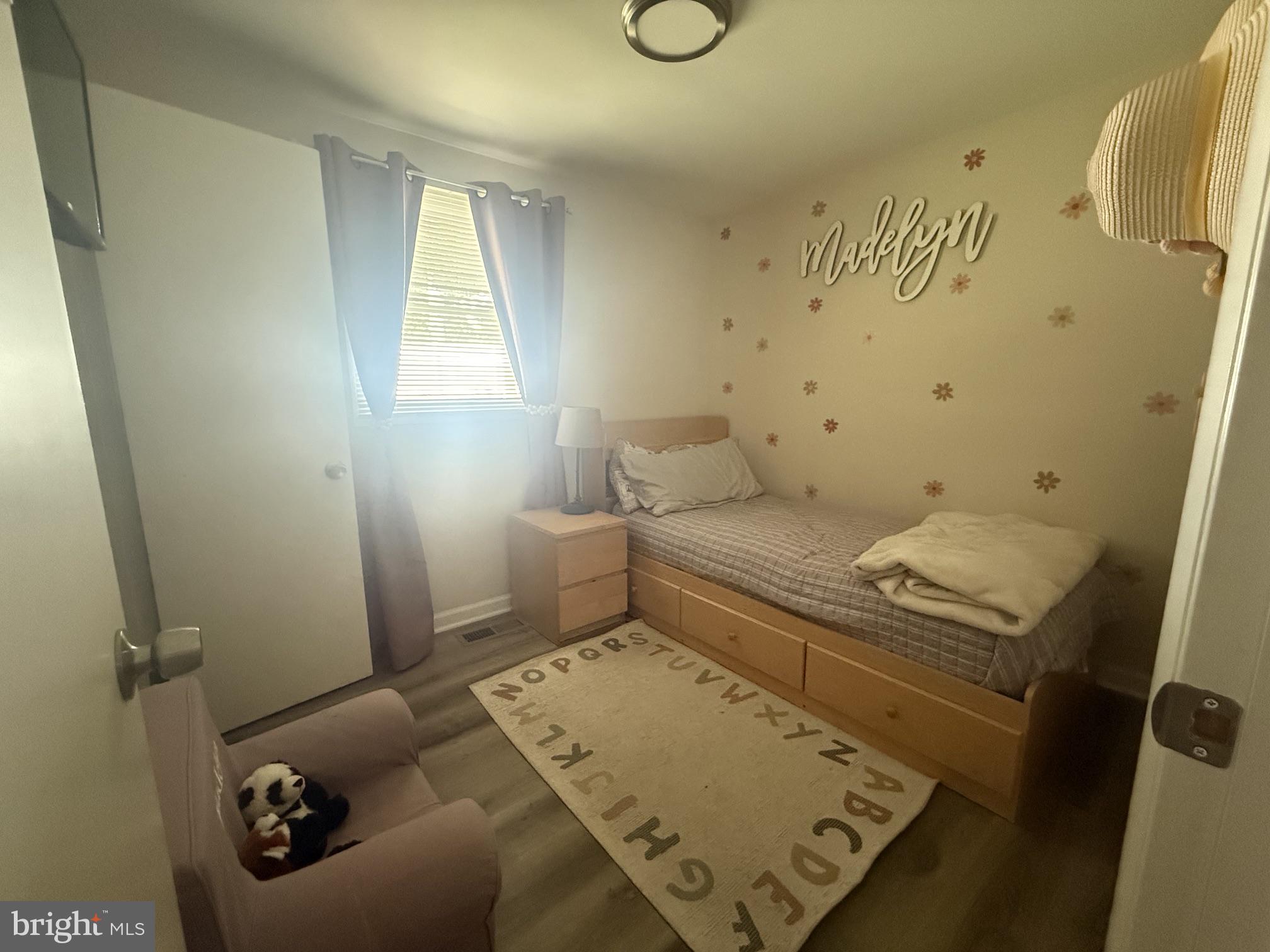 15073 Richmond Road Culpeper, VA 22701 - Photo 10 of 14 Cozy, sunlit bedroom with charm.