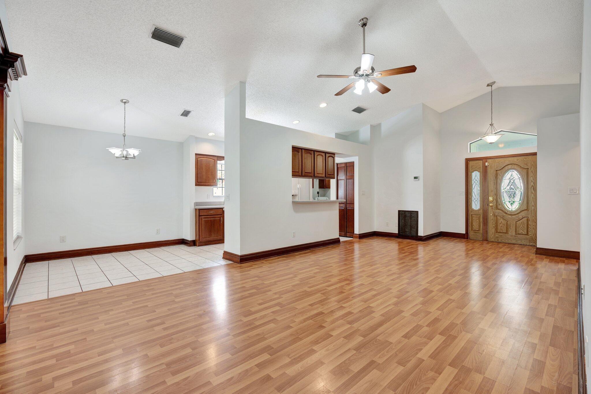 6149 Foster Street Jupiter, FL 33458 - Photo 4 of 25 LIVING TO ENTRY
