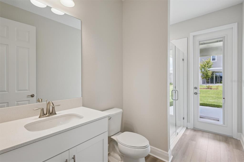 5178 Everlong Drive Apollo Beach, FL 33572 - Photo 19 of 25 a bathroom with a sink toilet and shower