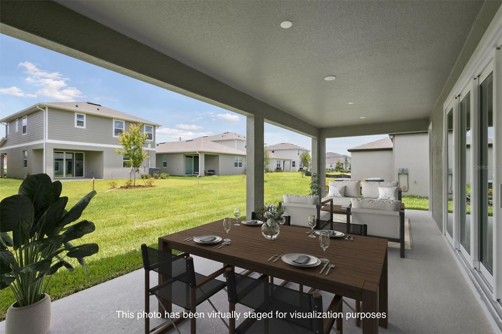 5178 Everlong Drive Apollo Beach, FL 33572 - Photo 23 of 25 a view of a dining room with furniture window and outside view