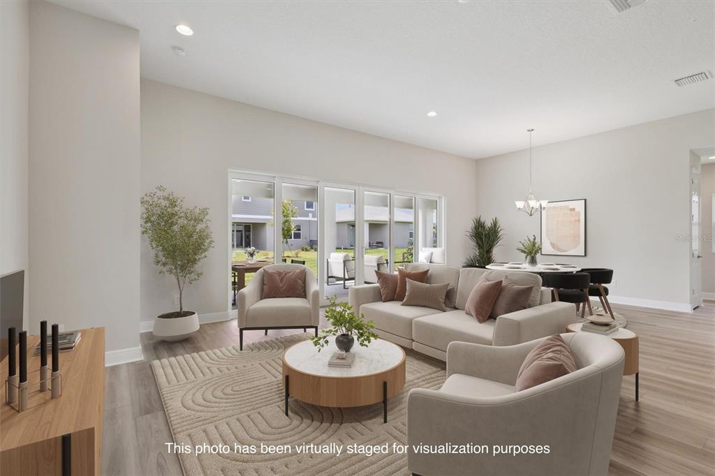 5178 Everlong Drive Apollo Beach, FL 33572 - Photo 3 of 25 a living room with furniture and a large window