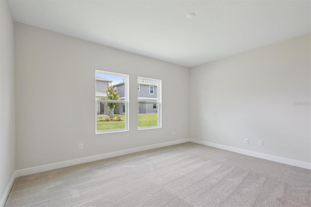 5178 Everlong Drive Apollo Beach, FL 33572 - Photo 5 of 25 an empty room with a window
