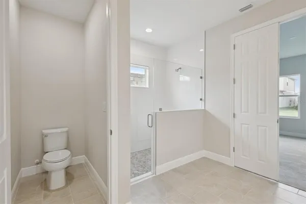 a bathroom with a toilet