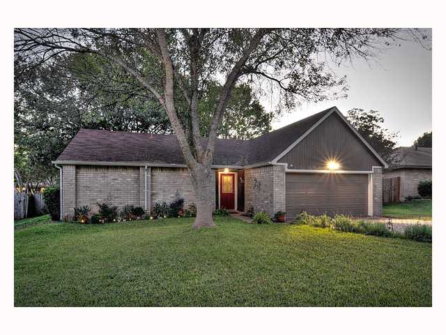 1505 Quail Run Road Pflugerville, TX 78660 - Photo 1 of 1 a front view of house with yard and green space