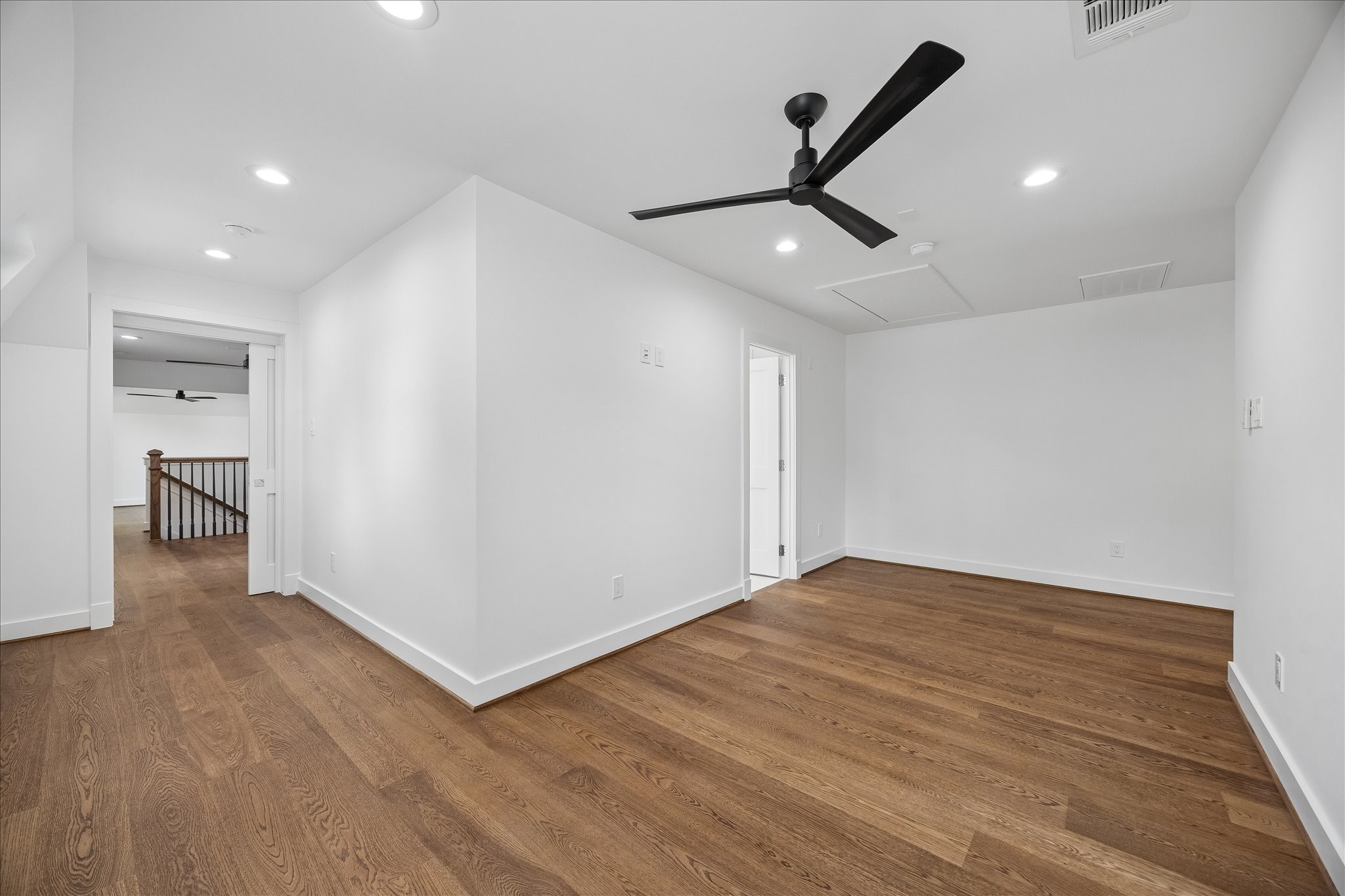 620 Stoneleigh Drive Houston, TX 77079 - Photo 23 of 39 Centrally located between the secondary bedrooms and the mother-in-law suite, the gameroom offers a spacious and versatile gathering area, ideal for relaxing, entertaining, or everyday living.