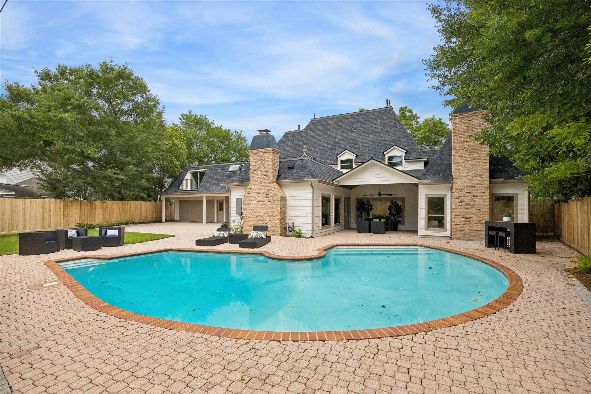620 Stoneleigh Drive Houston, TX 77079 - Photo 35 of 39 Whether taking a refreshing dip in the pool, tending to the garden beds, or simply enjoying the tranquility of the greenery, this backyard offers a peaceful and rejuvenating escape for residents to enjoy the beauty of the outdoors right at home.