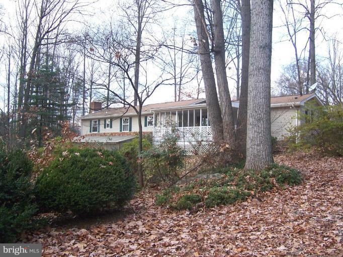 2121 Blue Mt Road Monkton, MD 21111 - Photo 6 of 8 a view of a house with a yard
