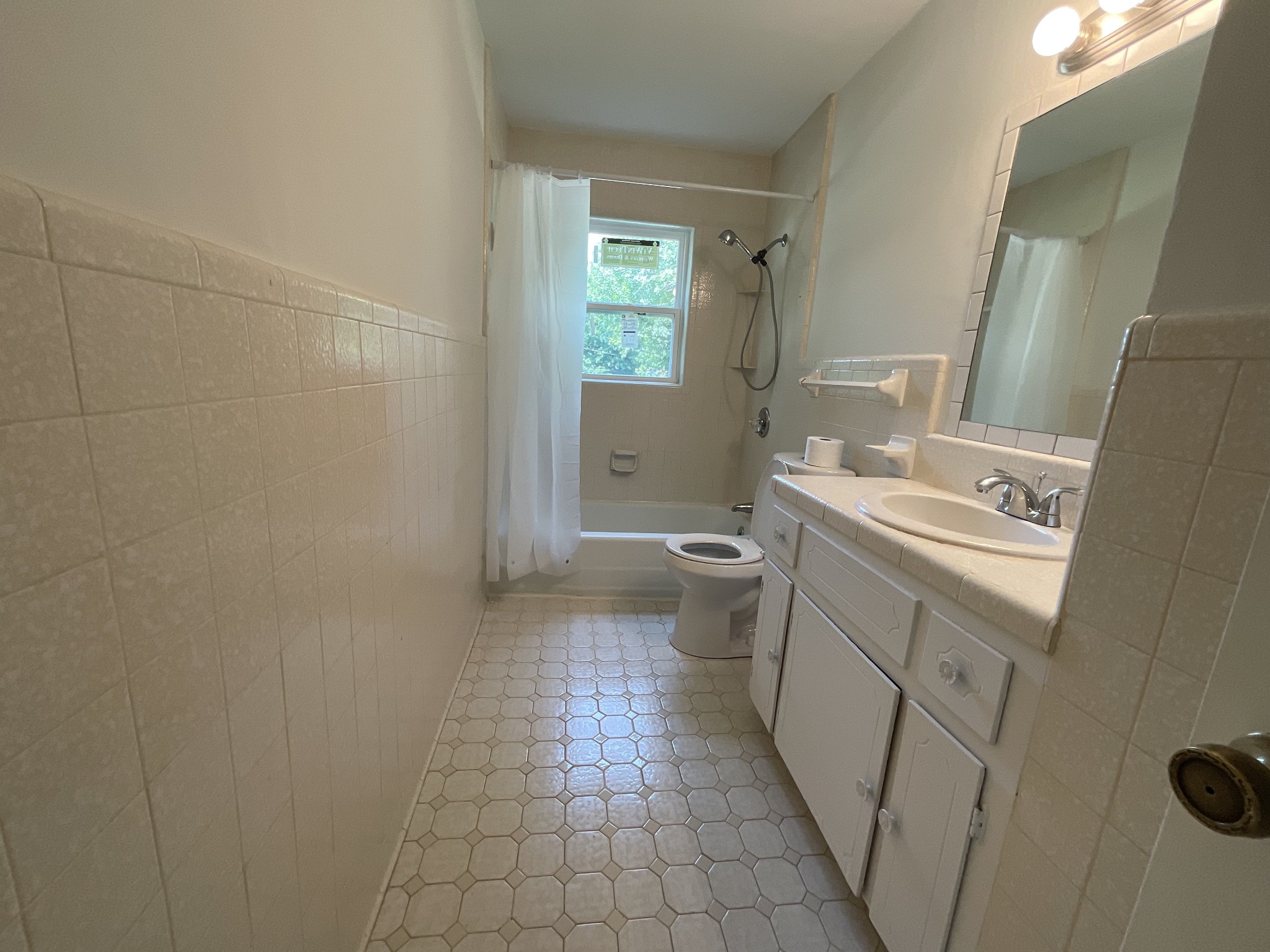 624 Fall River Road Lawrenceburg, TN 38464 - Photo 16 of 22 a bathroom with a sink a toilet and shower