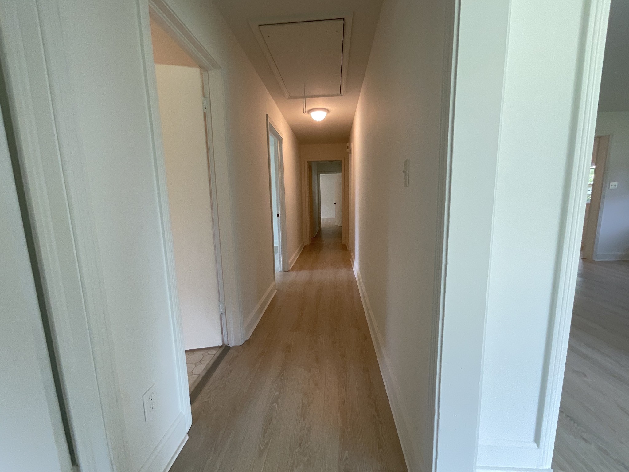 624 Fall River Road Lawrenceburg, TN 38464 - Photo 17 of 22 a view of hallway with wooden floor