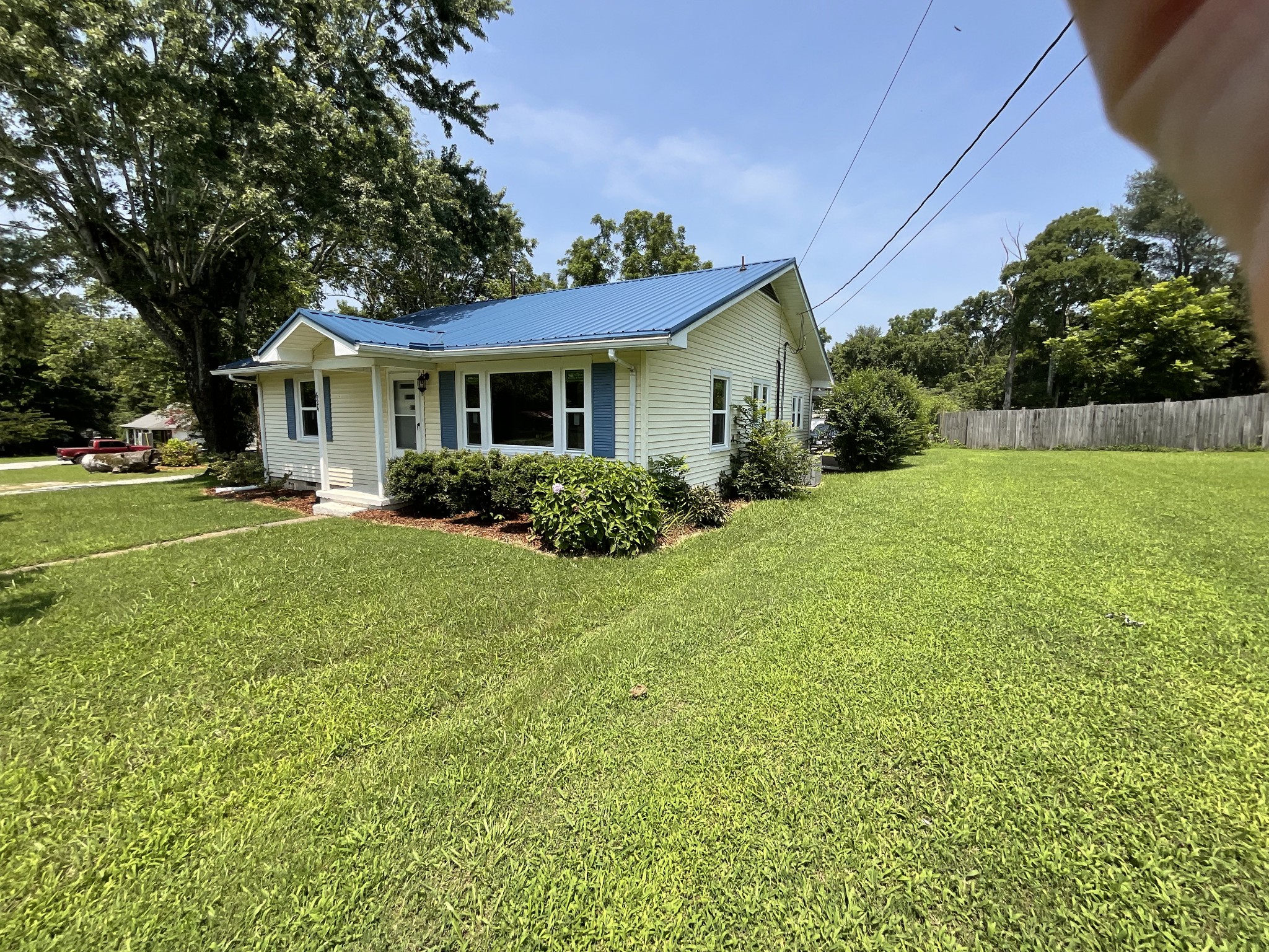 624 Fall River Road Lawrenceburg, TN 38464 - Photo 3 of 22 a front view of house with yard and green space