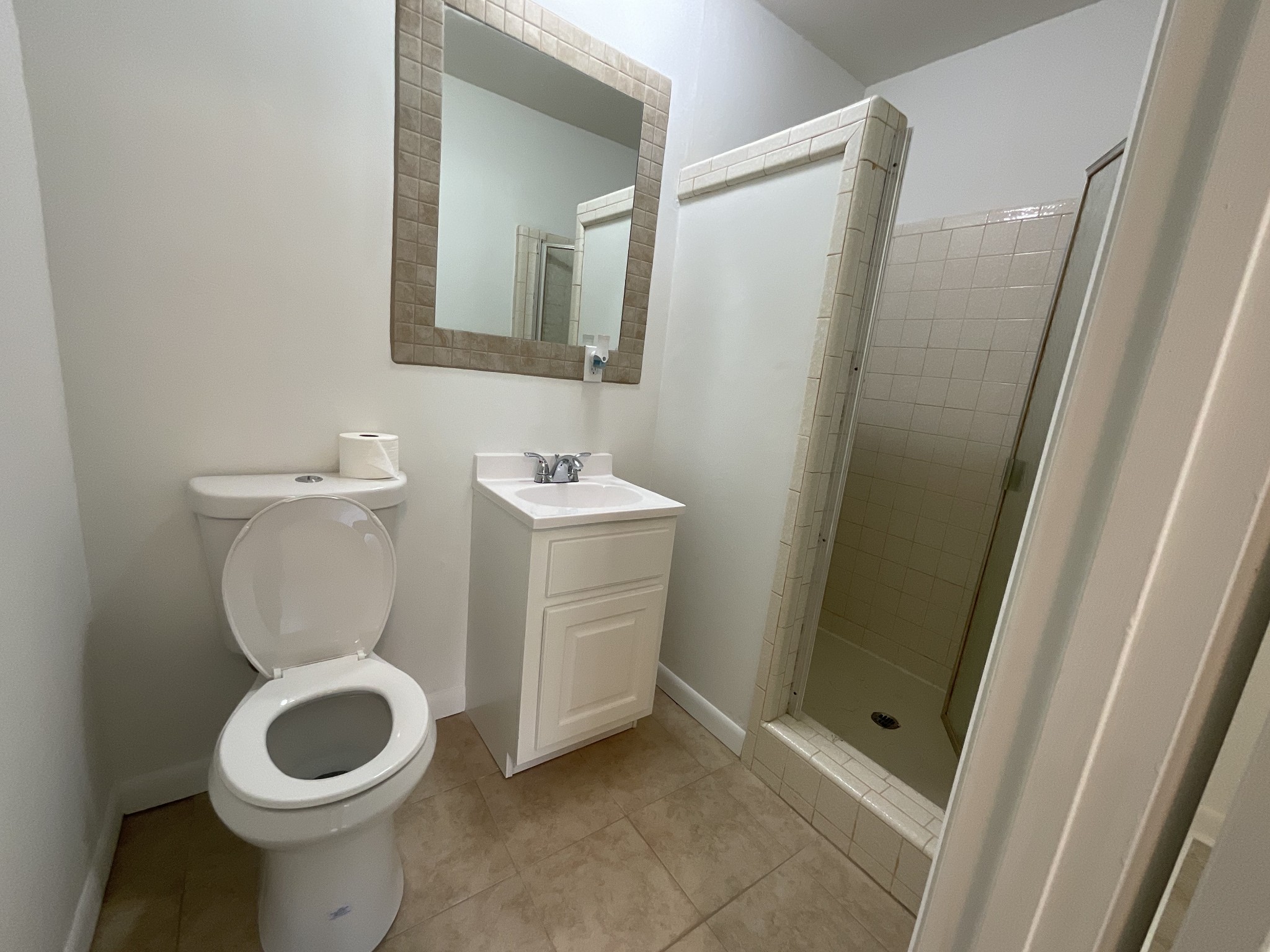 624 Fall River Road Lawrenceburg, TN 38464 - Photo 22 of 22 a bathroom with a toilet sink and mirror