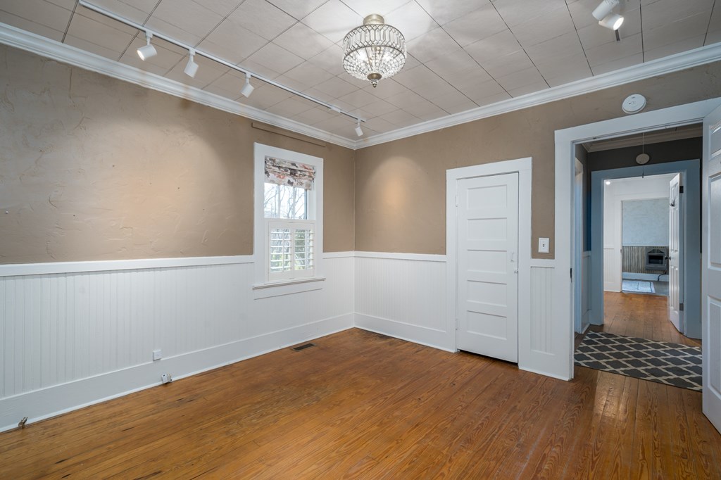 425 West First Street Blue Ridge, GA 30513 - Photo 13 of 33 wooden floor in an empty room with a window