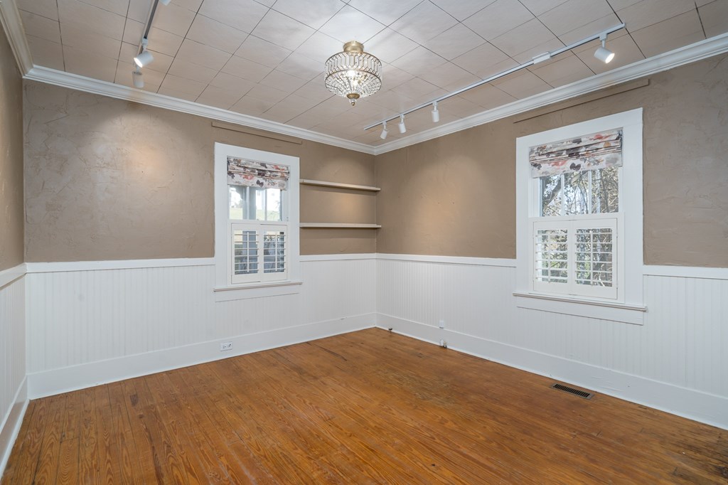 425 West First Street Blue Ridge, GA 30513 - Photo 14 of 33 a bedroom with a bed and a window