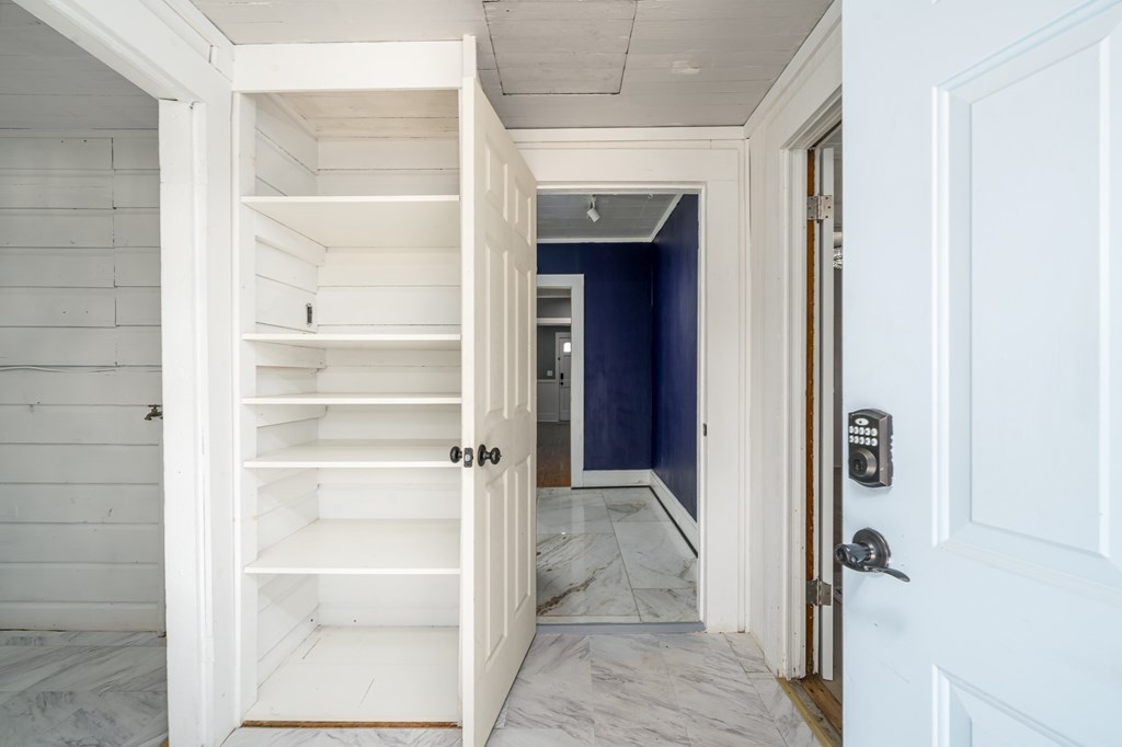 425 West First Street Blue Ridge, GA 30513 - Photo 21 of 33 a view of a hallway with wooden floor and closet