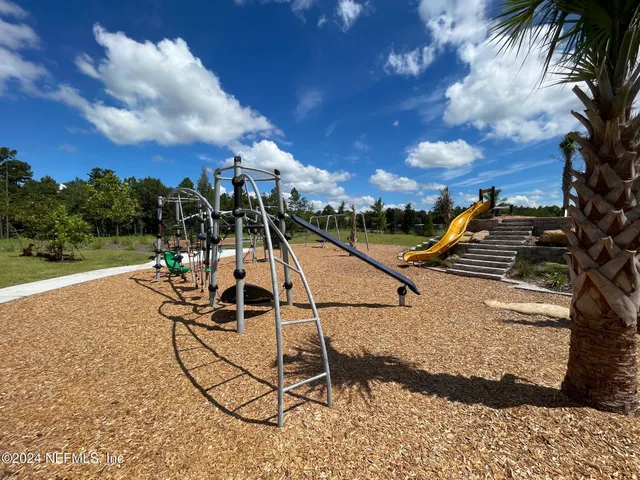 a view of a park with swings