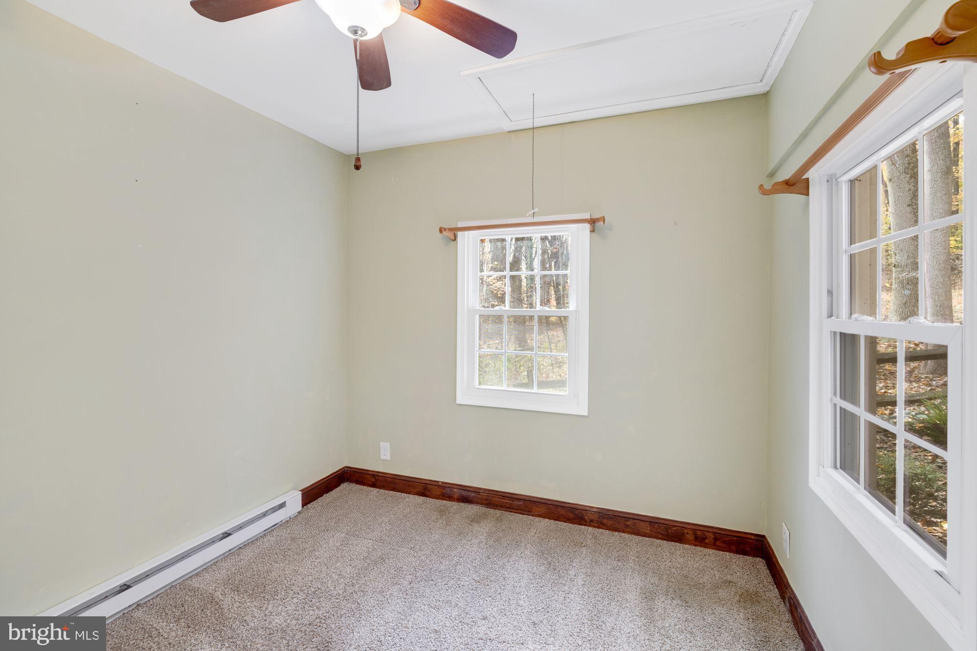 41788 Stumptown Road Leesburg, VA 20176 - Photo 17 of 31 a view of an empty room with a window