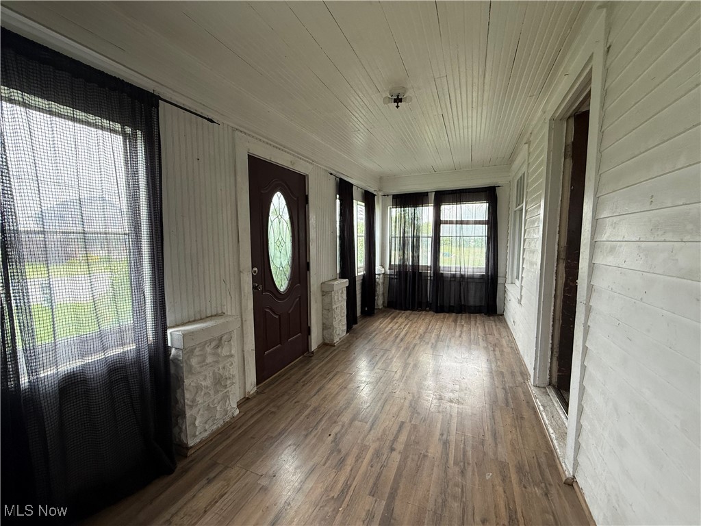 9307 Portland Road Castalia, OH 44824 - Photo 17 of 23 Enclosed porch entry at front of house