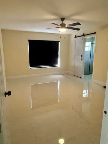 a view of a livingroom with a flat screen tv