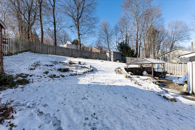 a view of house with outdoor seating