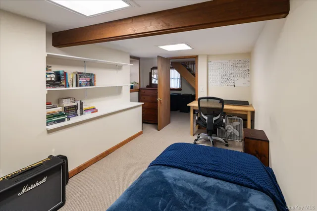 a bed room with a bed and a desk