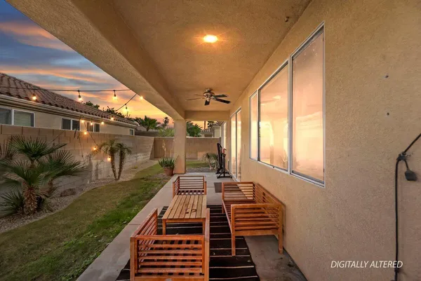a backyard of a house with seating space