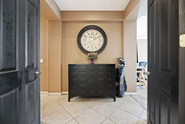a clock on a wall in a kitchen