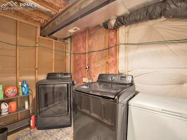 a bedroom with a bed and a chair