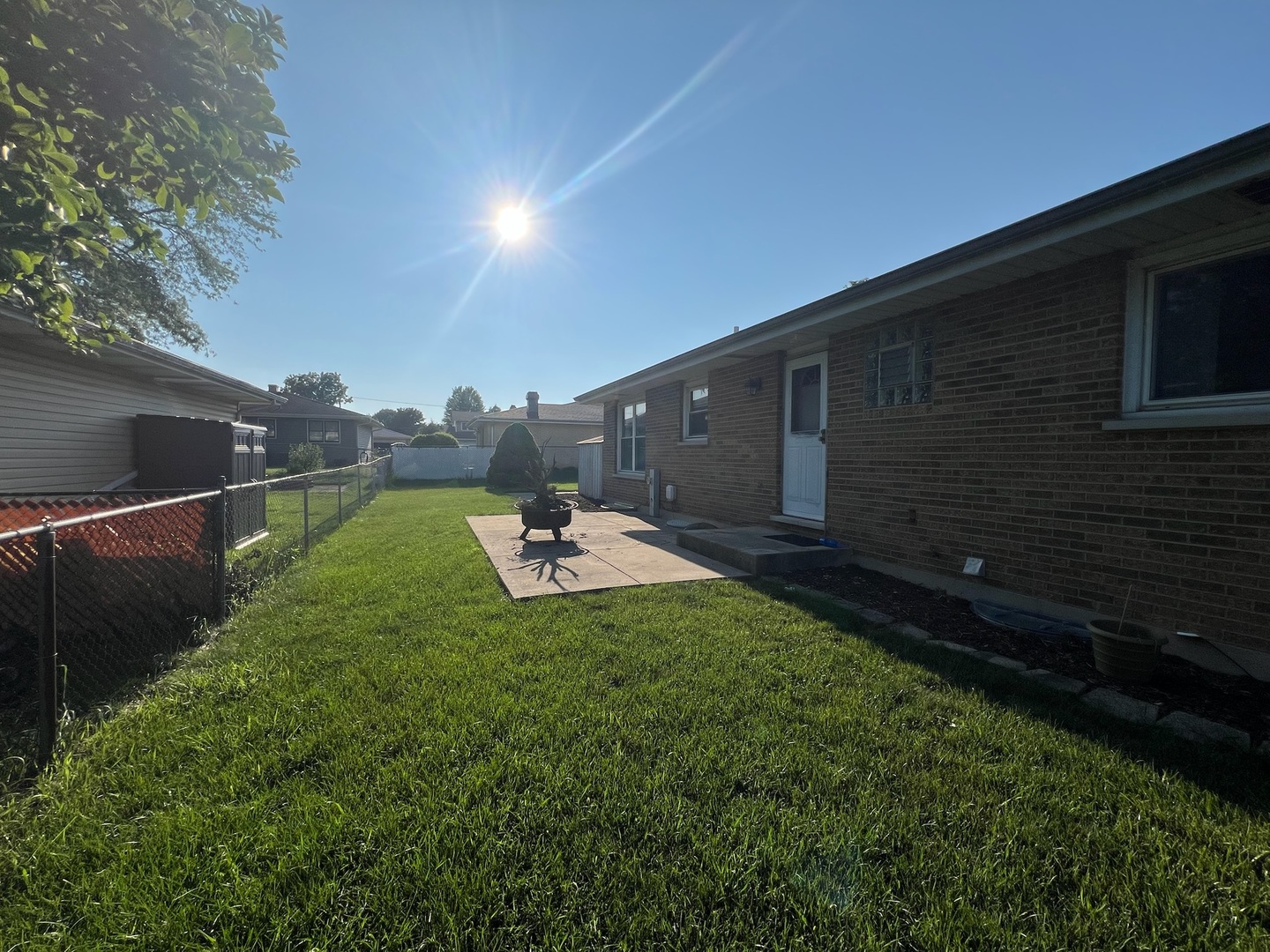 548 Delaware Trail Carol Stream, IL 60188 - Photo 26 of 26 a view of a backyard with sitting area