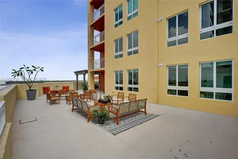 a view of pool with outdoor seating