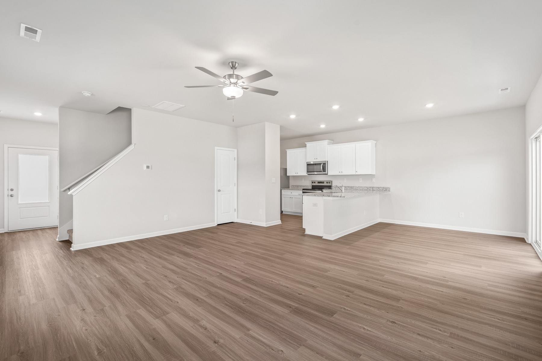 2038 Lala Loop White Bluff, TN 37187 - Photo 2 of 14 a view of a kitchen with a sink and a kitchen view