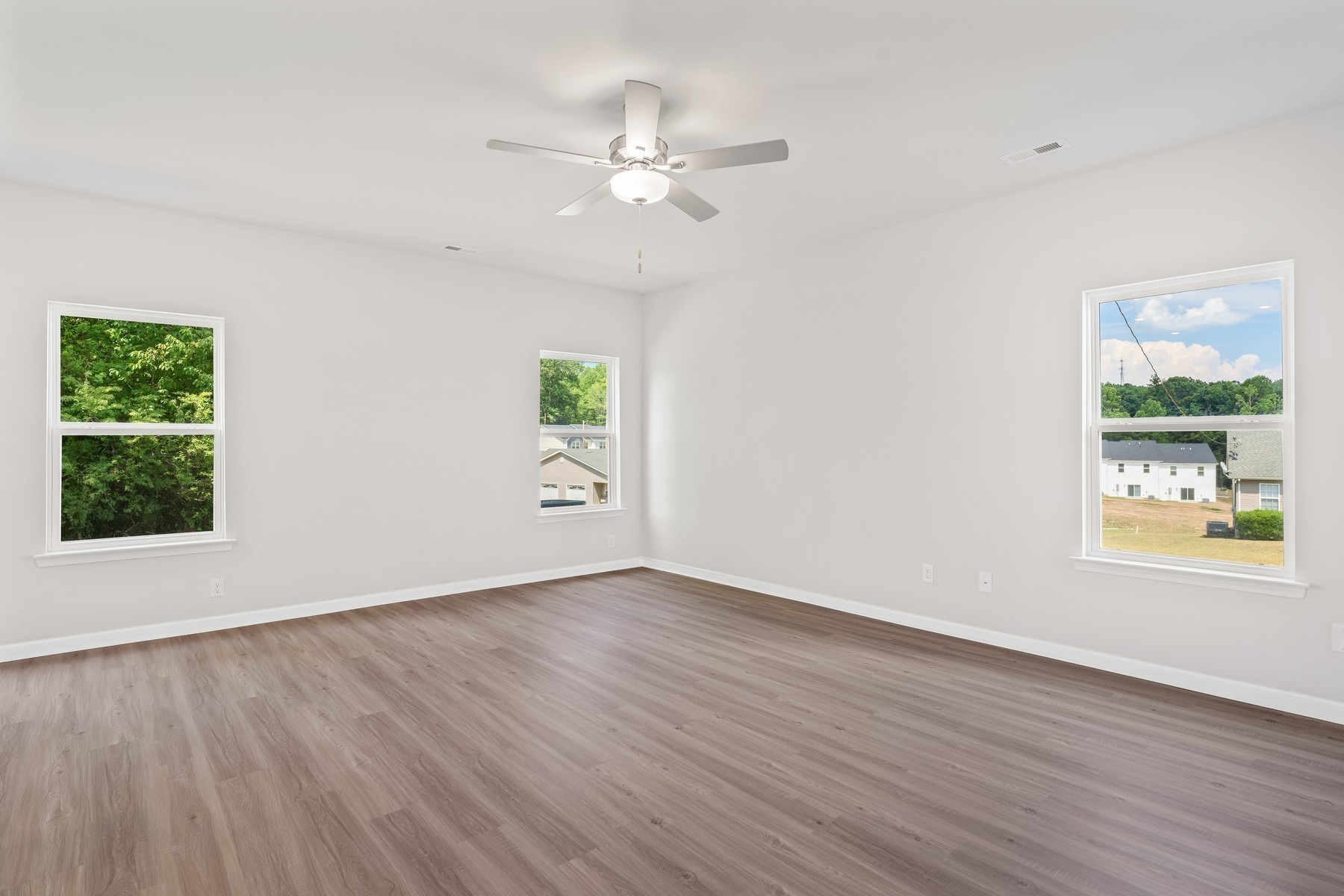 2038 Lala Loop White Bluff, TN 37187 - Photo 4 of 14 a view of an empty room with wooden floor and a window