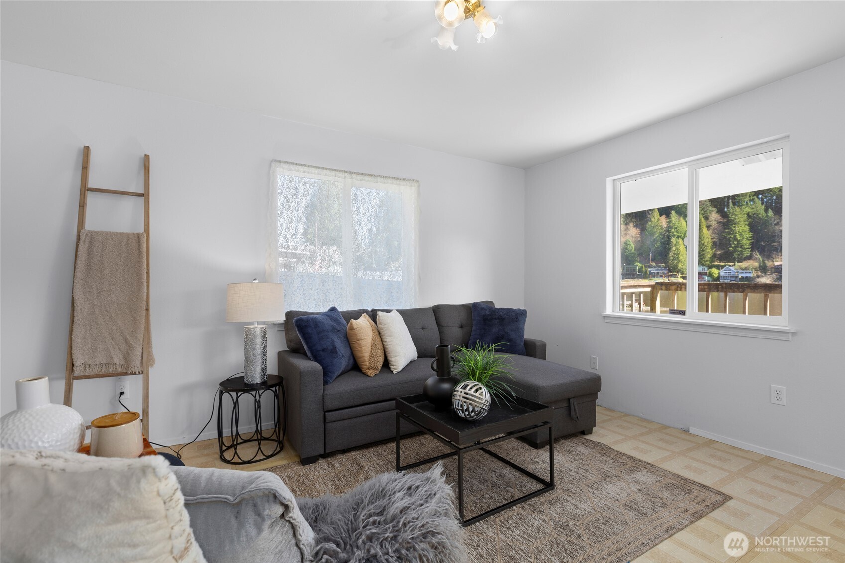 39201 Orville Road East Eatonville, WA 98328 - Photo 12 of 30 a living room with furniture and a window